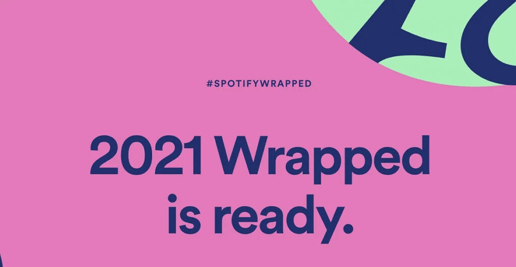 Spotify 2021 wrapped visual design with a bright pink background with lime green and navy blue details - with the #SpotifyWrapped

And the title: 2021 Wrapped Is Ready