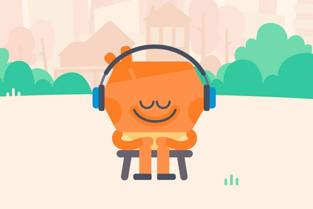 Headspace illustration of character happily sitting in park listening to music